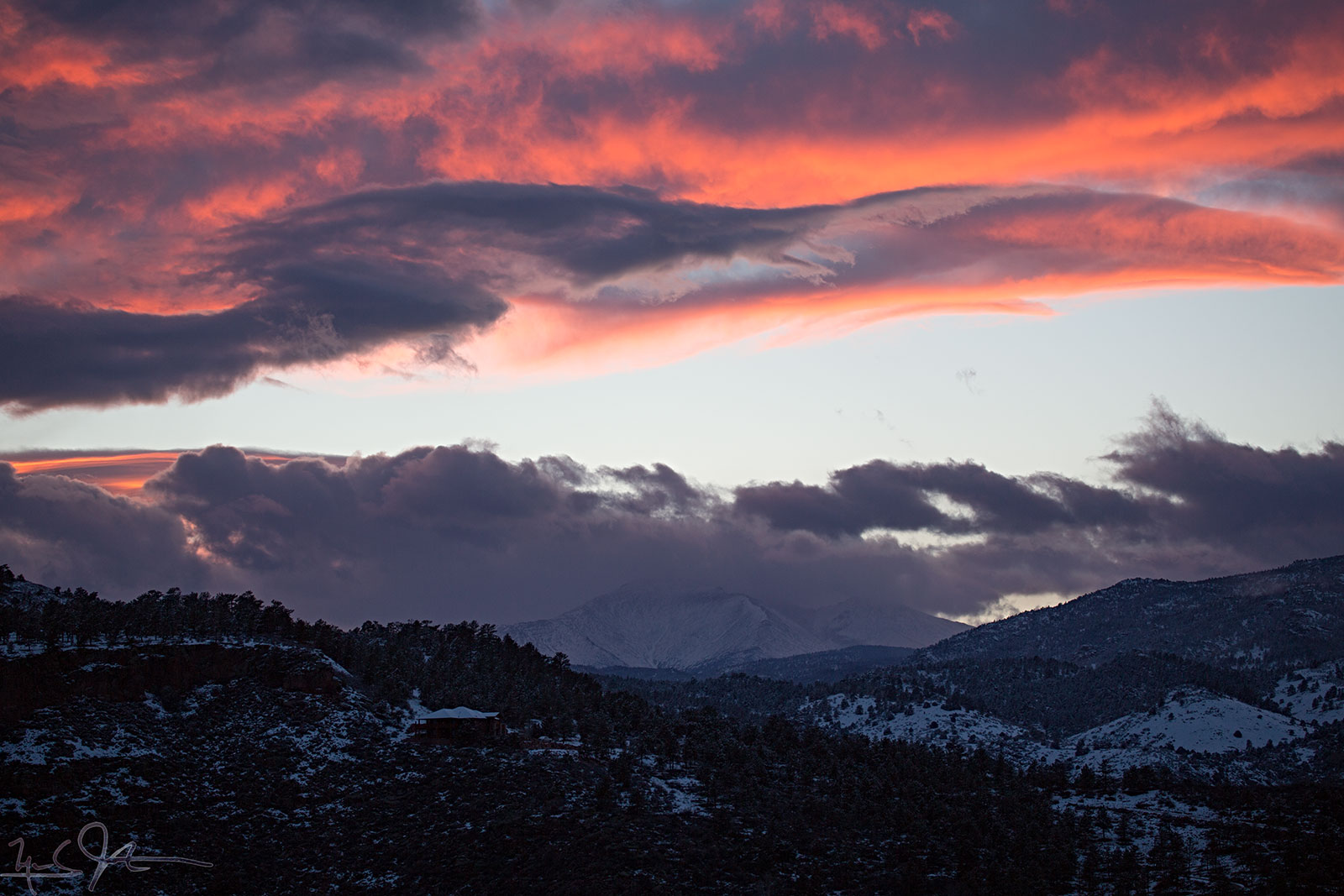 Blue skies appear over Mt. Meeker and Long's Peak.