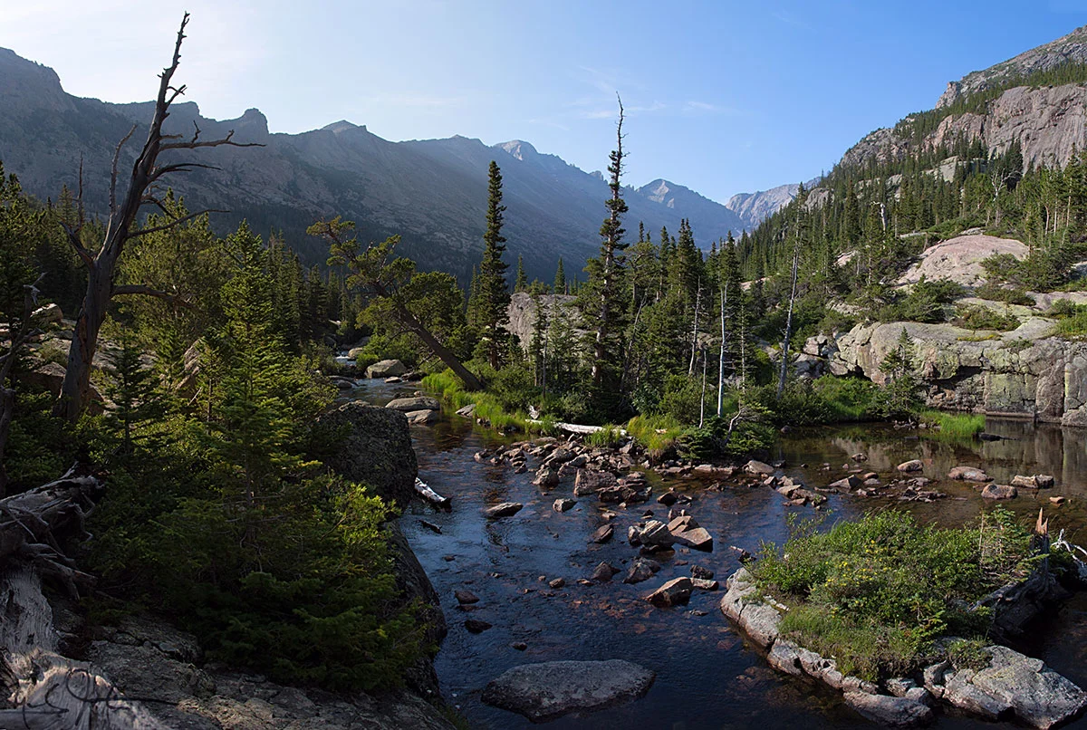 The approach to Mills Lake in Glacier Gorge, Rocky Mountain National Park. Long's Peak is the squarish dome on the horizon at center, and beyond, Keyboard of the Winds and Pagoda Mountain. 
