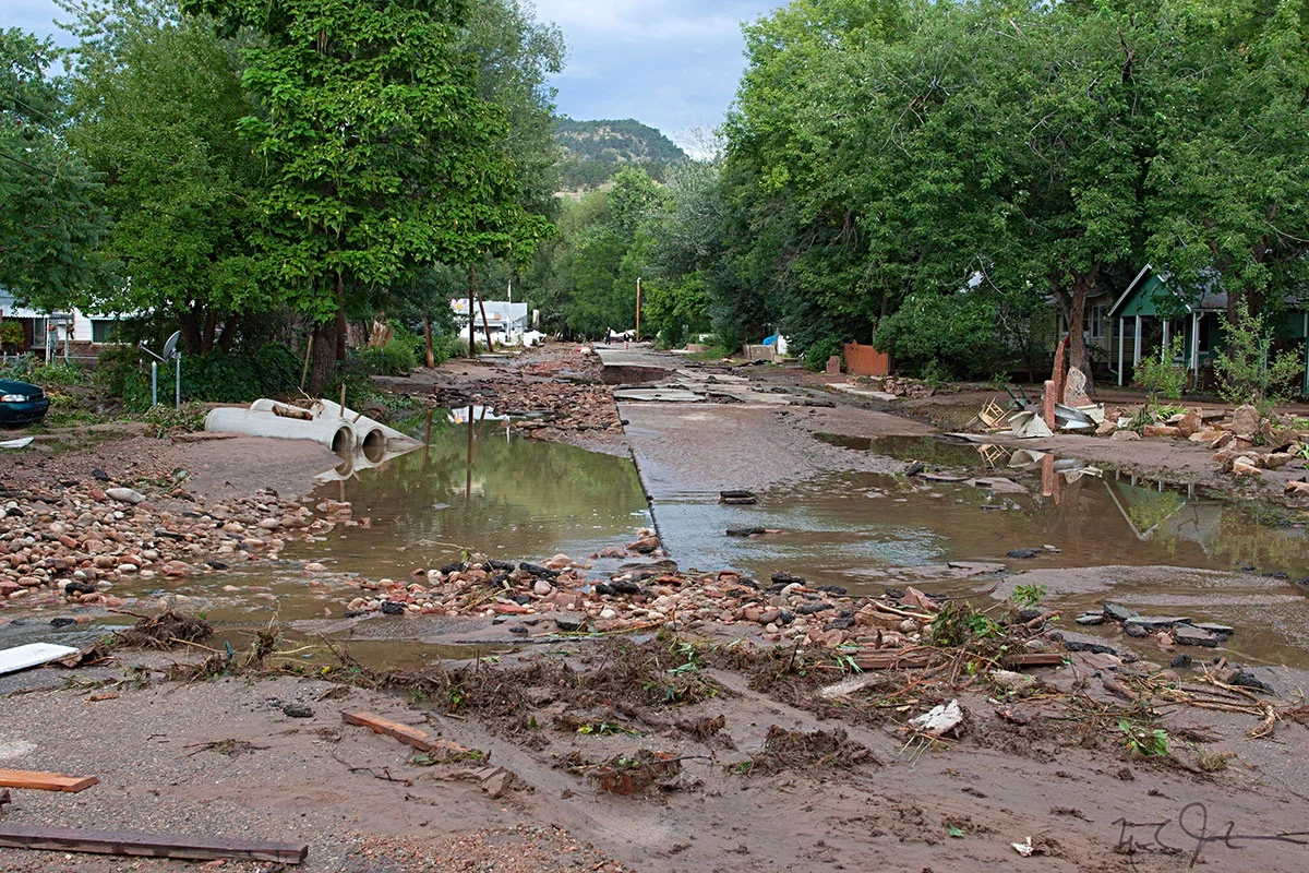 Many low-lying neighborhoods were inundated as the St. Vrain River overran its banks and even cut new channels through the town of Lyons, Colorado.