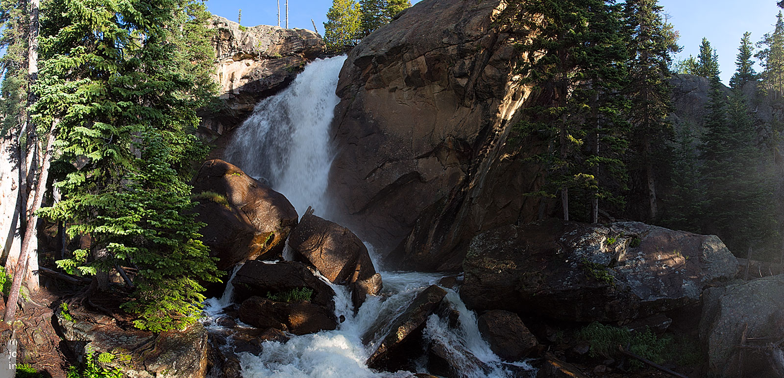 Ouzel Falls, 2.7 miles in. The trail crosses Ouzel Creek just below the falls, but the wooden bridge was carried away in the deluge of September 2013.