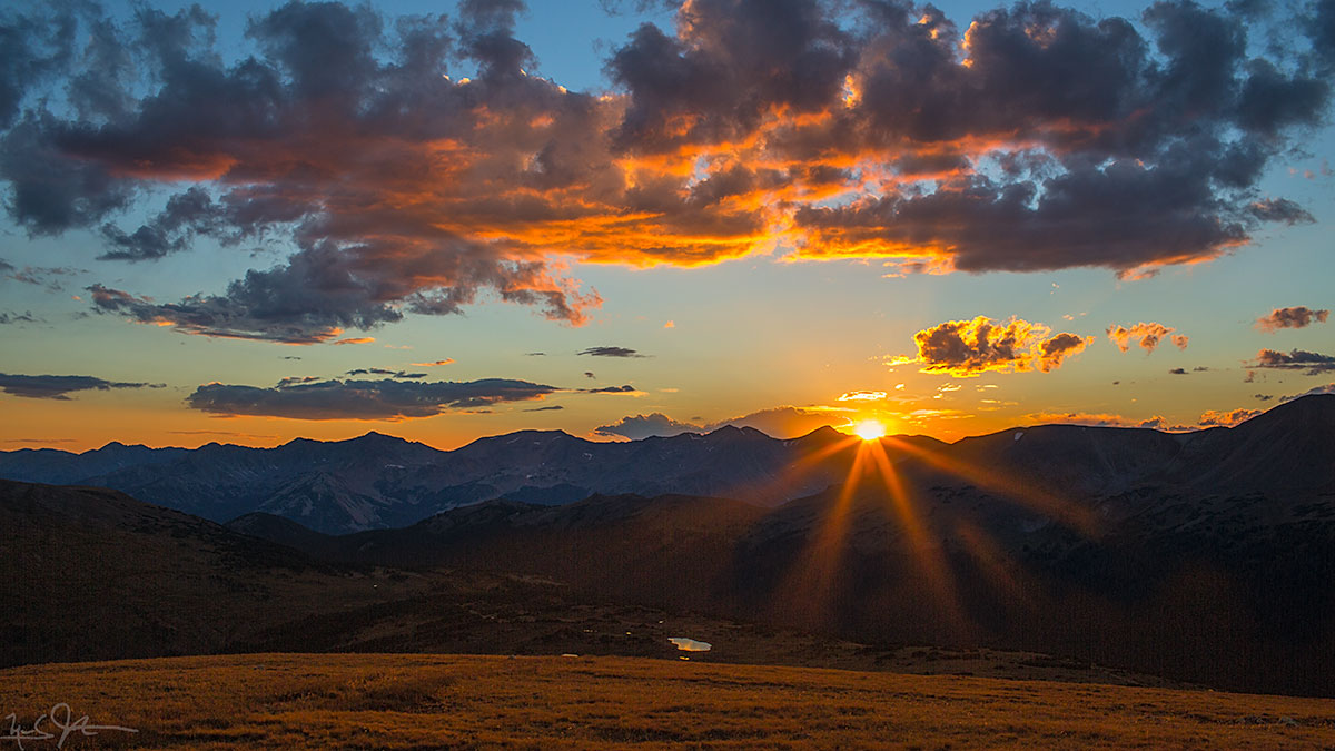 The sun sets over Mt. Cirrus in the Gore Range, about 50 miles away.
