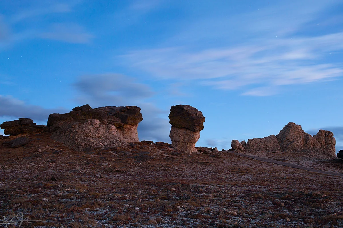 Mushroom rocks, formed when erosion occurs more rapidly on a softer layer of rock that lies underneath a harder top layer.