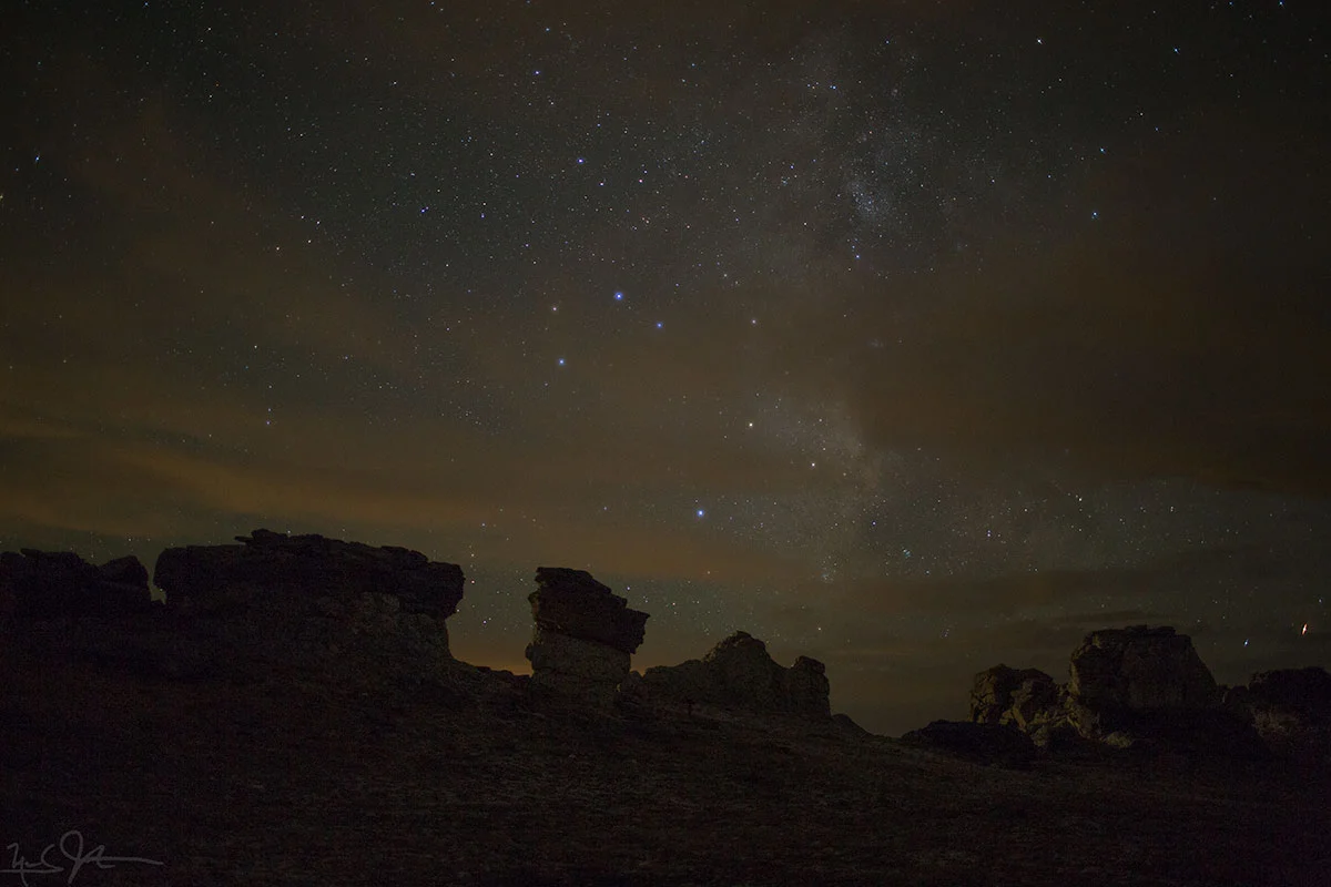 The Milky Way behind mushroom rocks.