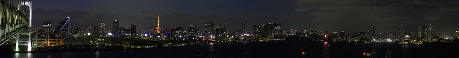 A panoramic view of Tokyo Harbor from one of the pedestrian parapets on Rainbow Bridge. Click on the image to expand. Enlarge your browser window for more detail.
