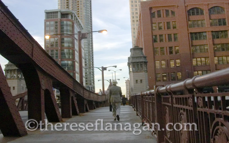 Man Walking on Bridge with Briefcase