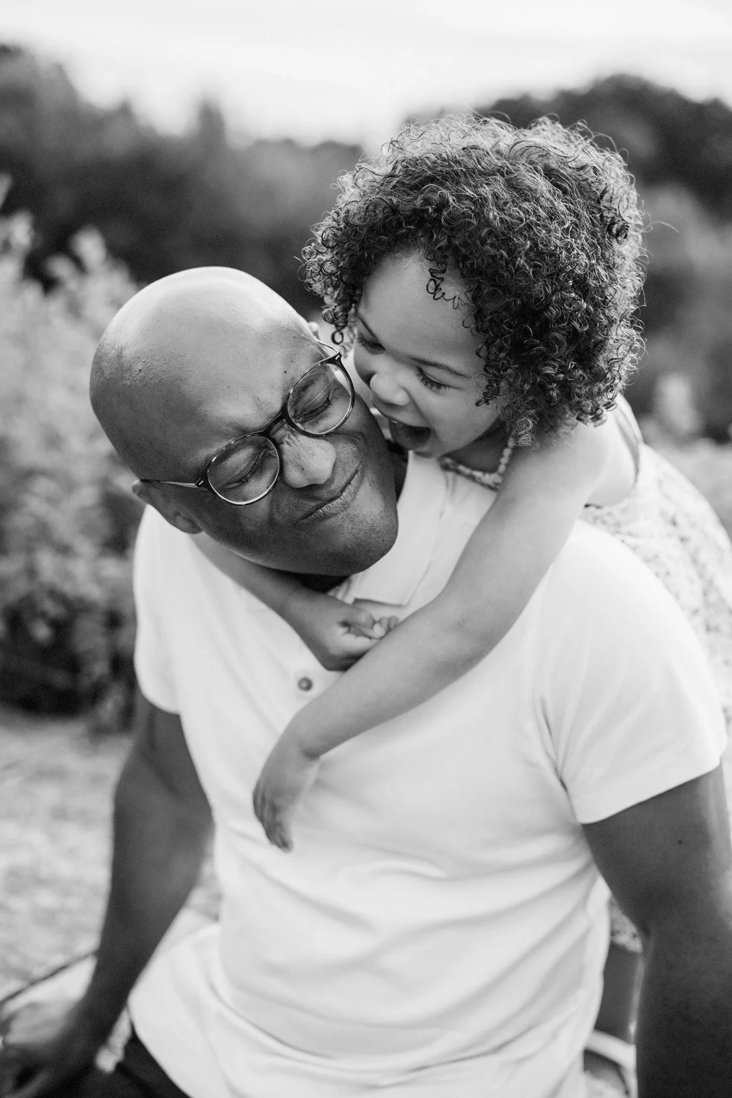 a candid documentary style family portrait on upper Queen Anne in Seattle by Seattle Family photographer Ryan Flynn