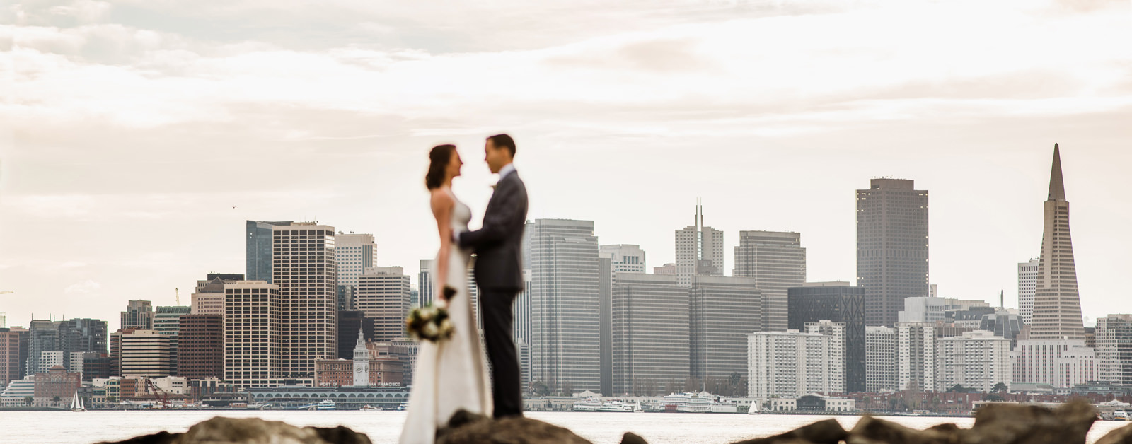 040-panoramic-portrait-of-a-bride-and-groom-overlooking-san-francisco-by-san-francisco-wedding-photographer.jpg
