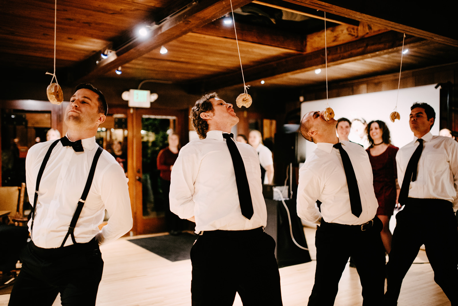 050-hilarious-wedding-game-of-donut-eating-contest-at-kiana-lodge.jpg