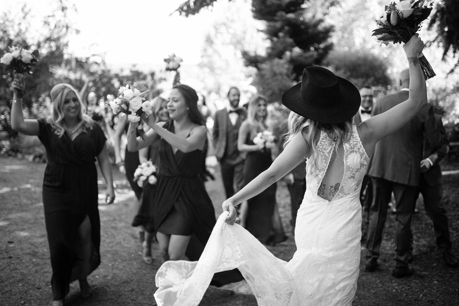 059-bride-in-a-hip-rue-de-seine-dress-celebrates-by-top-film-photographer-ryan-flynn.jpg