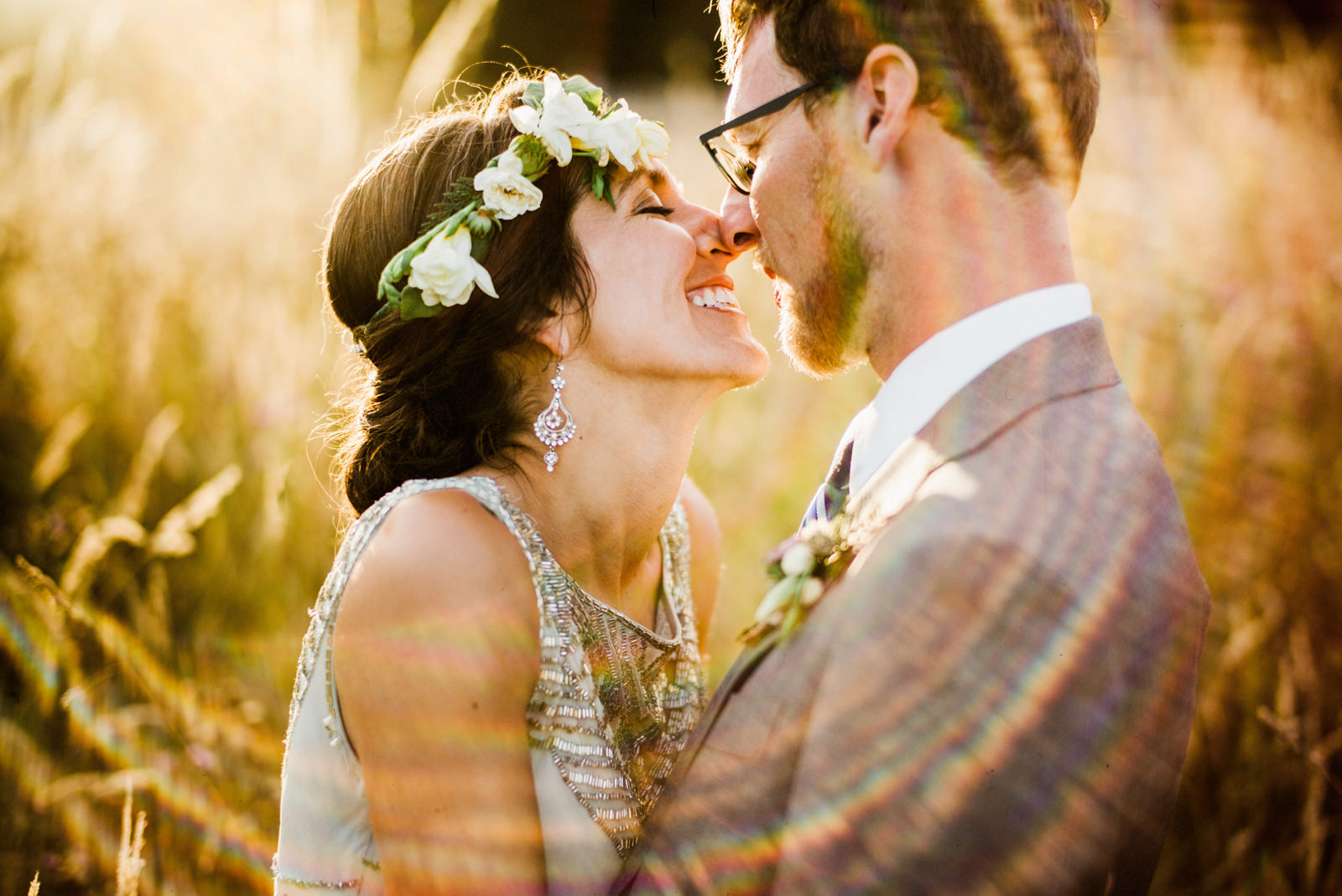 072-joyful-wedding-portrait-with-sunflare-and-pale-green-wedding-dress-by-orcas-island-wedding-photographer.jpg