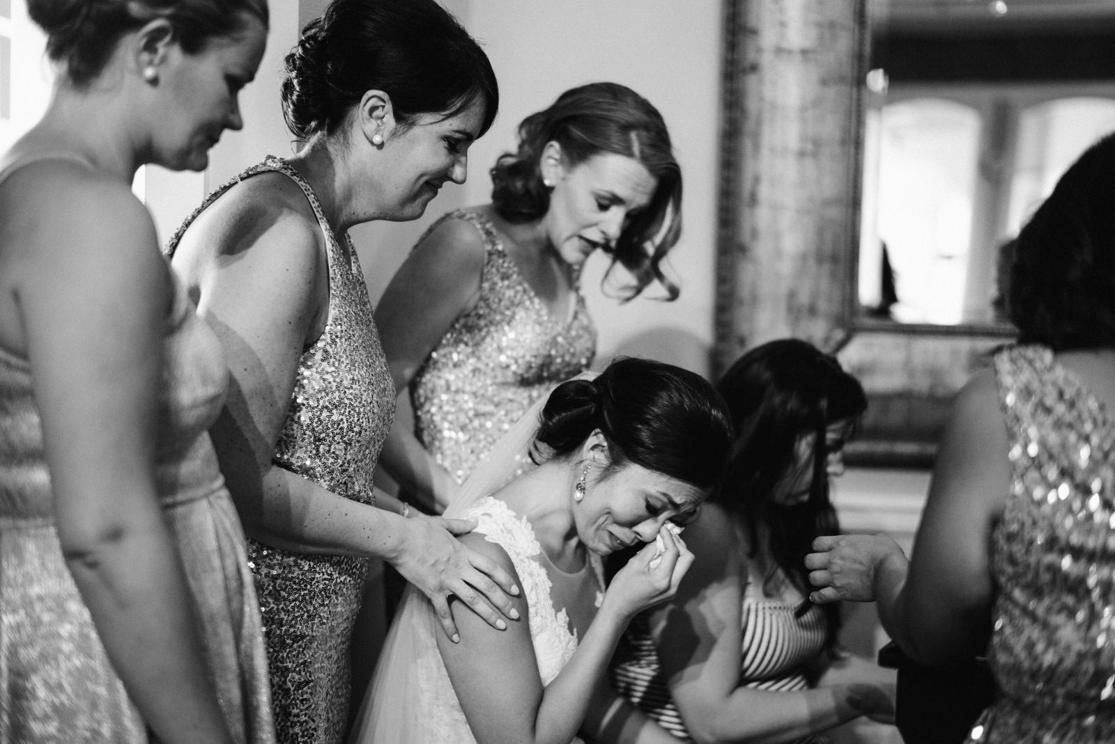 077-tearful-bride-praying-with-bridesmaids-on-leica-m240-by-washington-documentary-photographer-ryan-flynn.jpg