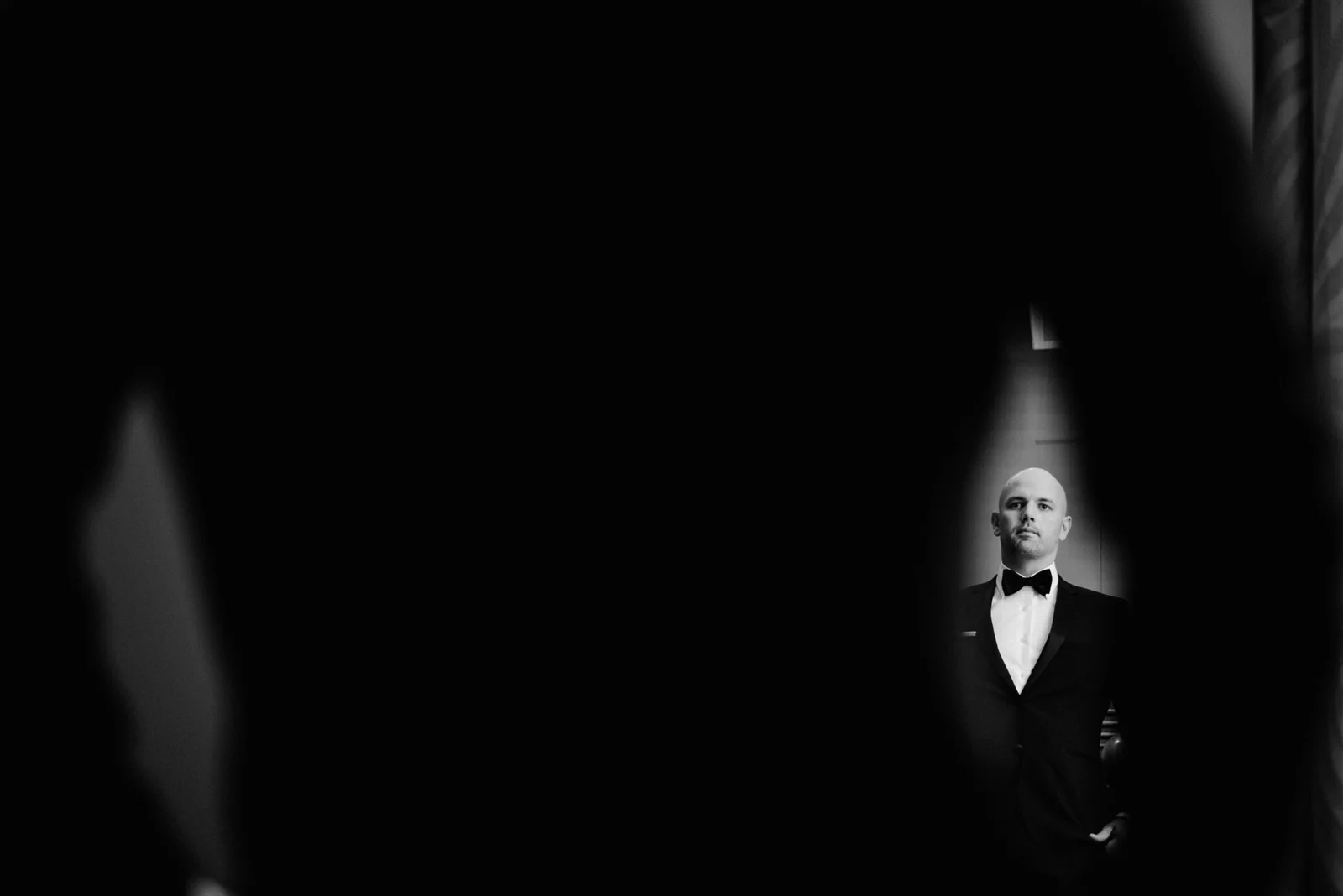 139-the-four-seasons-seattle-wedding-with-groom-in-black-tuxedo.jpg