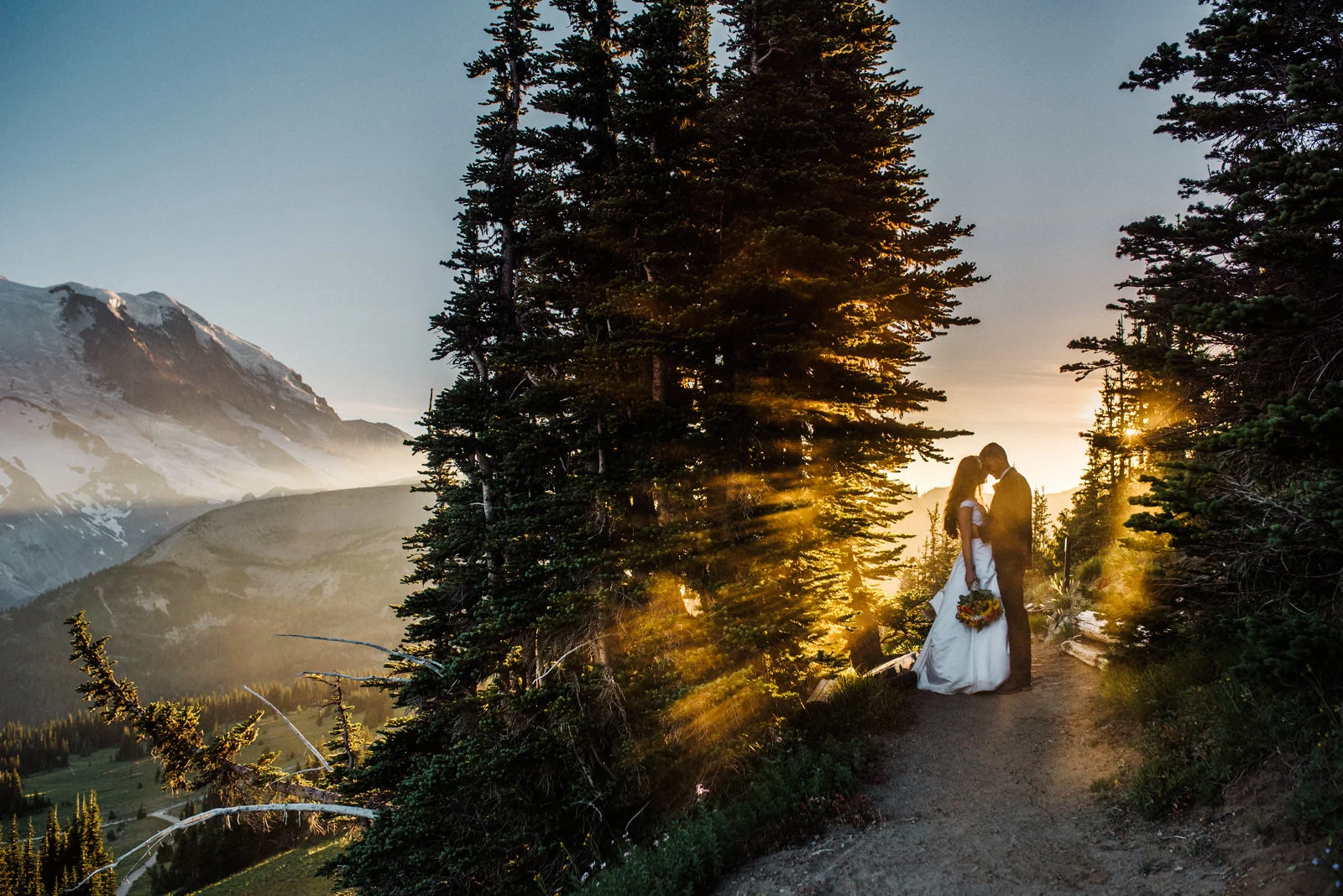 180-mt-rainier-elopement-photo-with-godrays-by-northwest-elopement-photographer.jpg