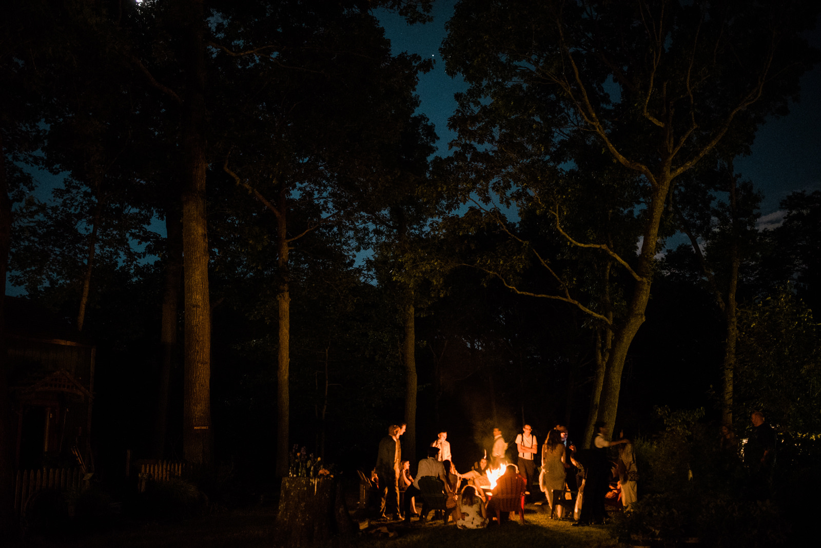 207-wedding-party-around-bonfire-at-the-peconic-river-herb-farm-by-brooklyn-photographer.jpg