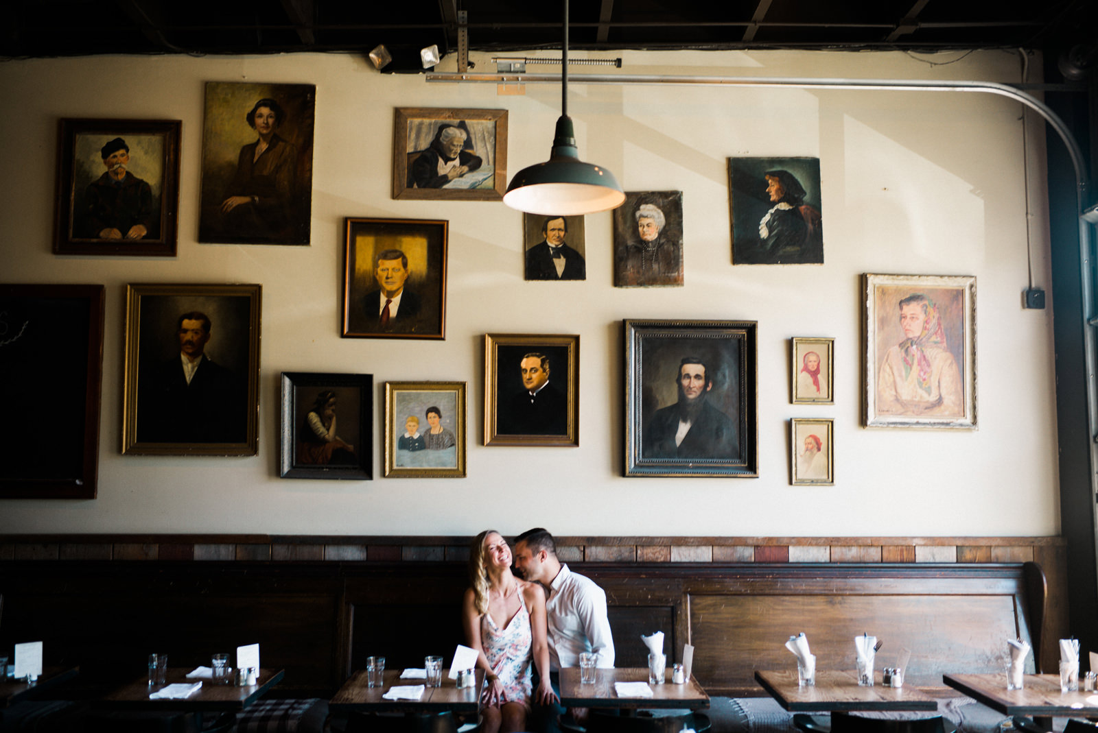 245-hip-indoor-engagement-session-in-seattle-with-paintings-on-wall-by-ryan-flynn.jpg