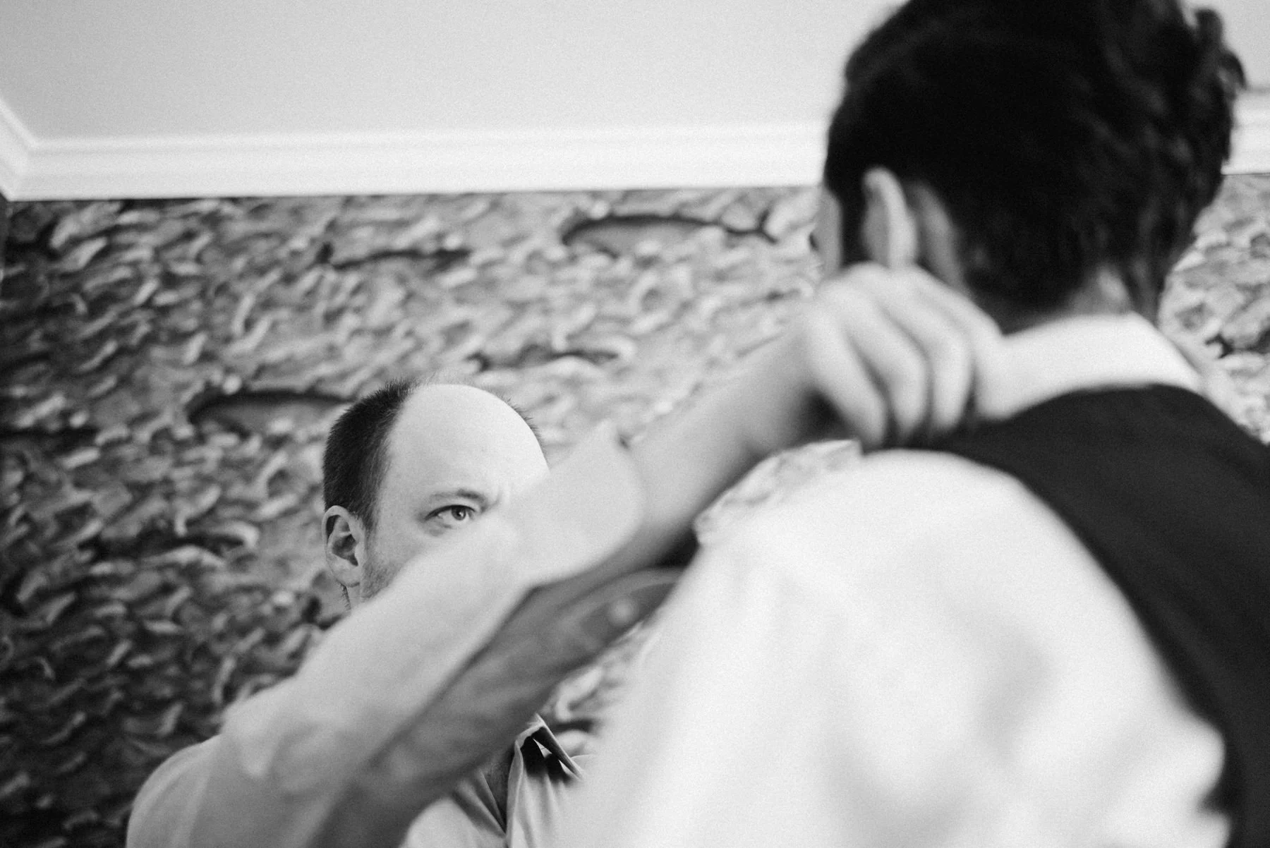 010-bride-and-groom-getting-ready-before-their-wedding-at-hotel-sorrento-in-seattle.jpg