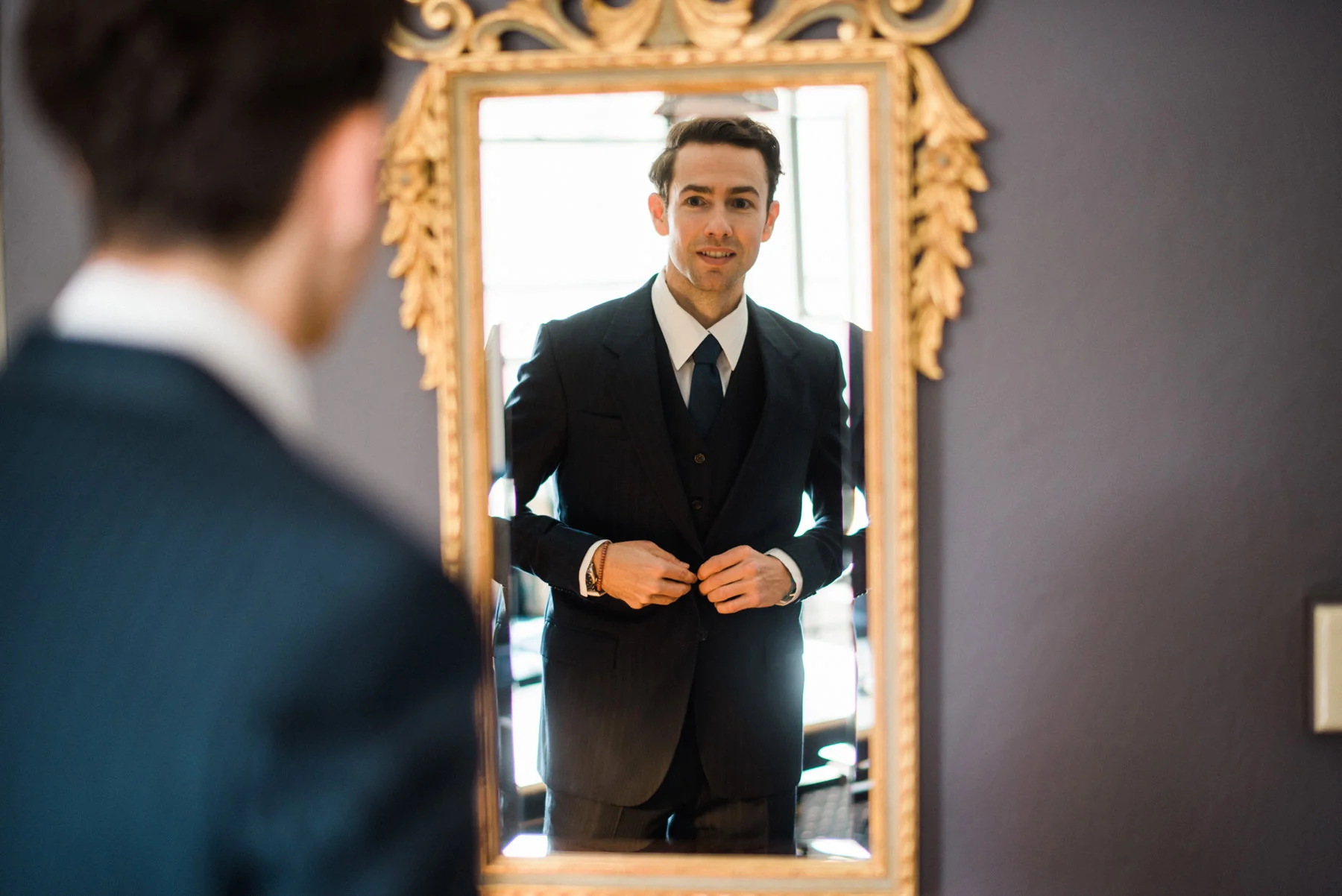 011-bride-and-groom-getting-ready-before-their-wedding-at-hotel-sorrento-in-seattle.jpg