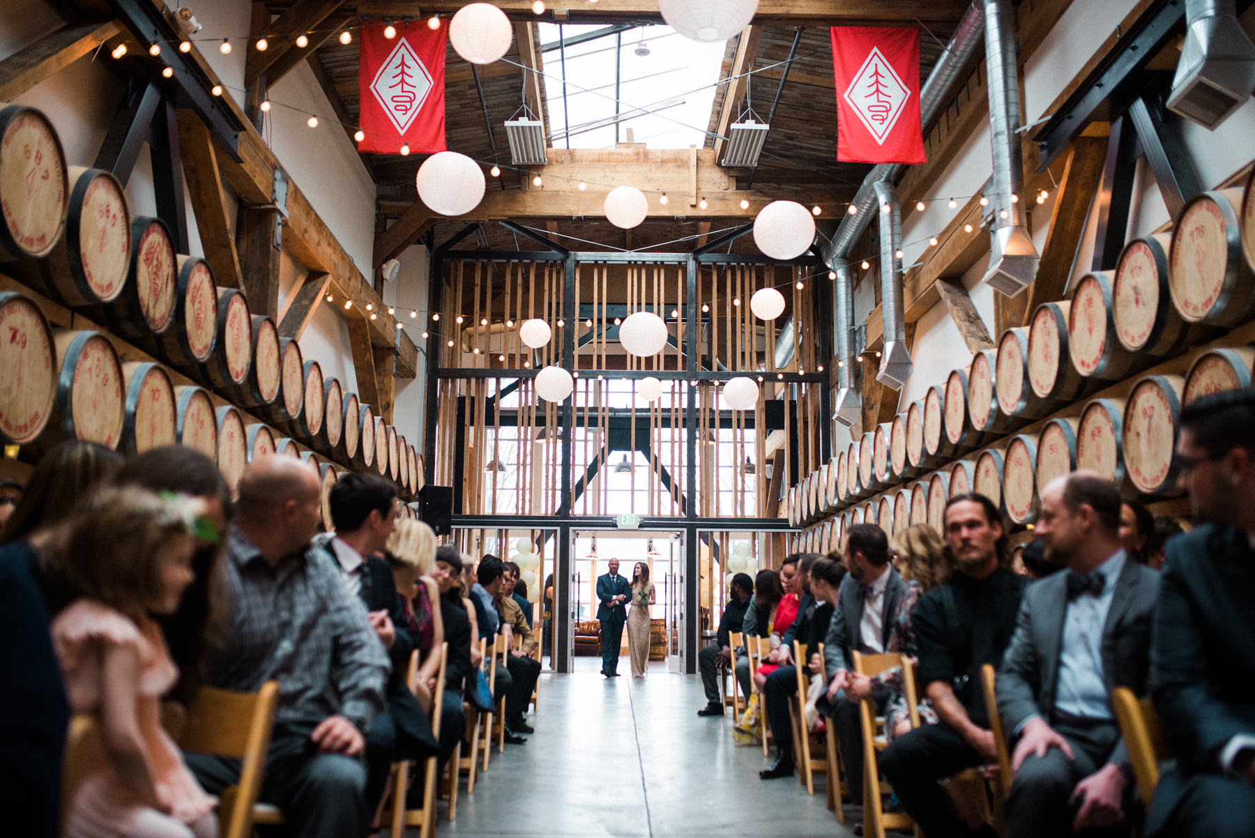 036-wedding-ceremony-among-whiskey-barrels-at-westland-distillery.jpg