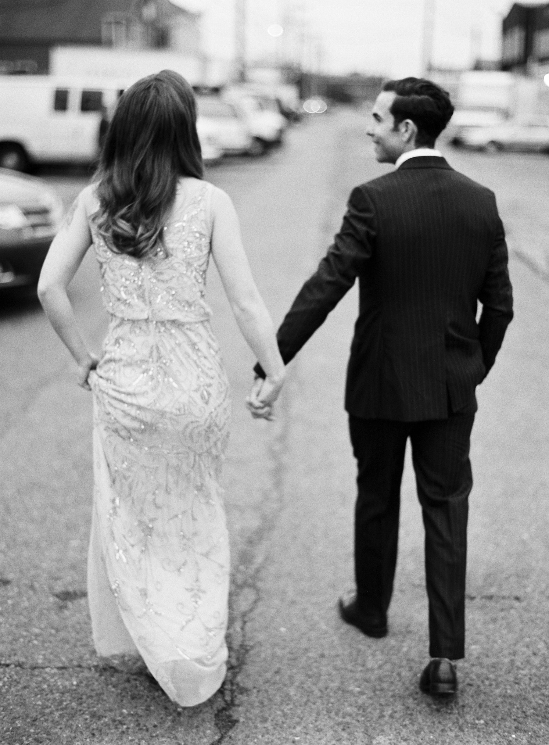 057-bridal-couple-walking-away-on-black-and-white-medium-format-film.jpg