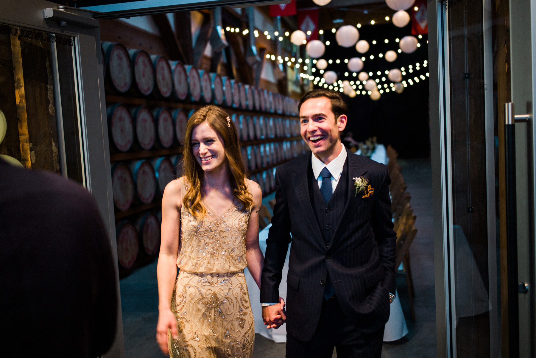 059-wedding-reception-under-cafe-lights-at-westland-distillery.jpg