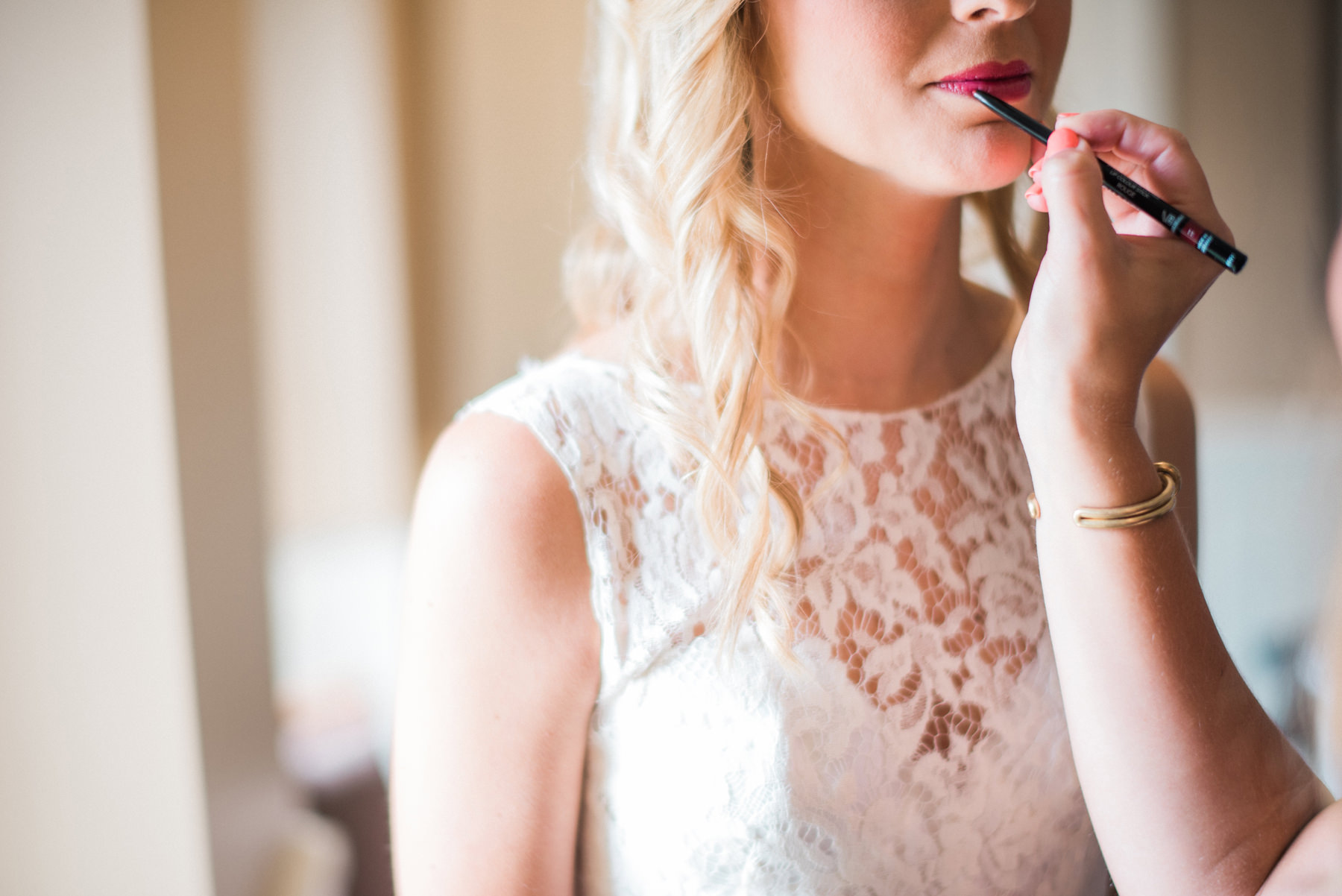 166-close-up-of-bride-getting-lipstick-done.jpg