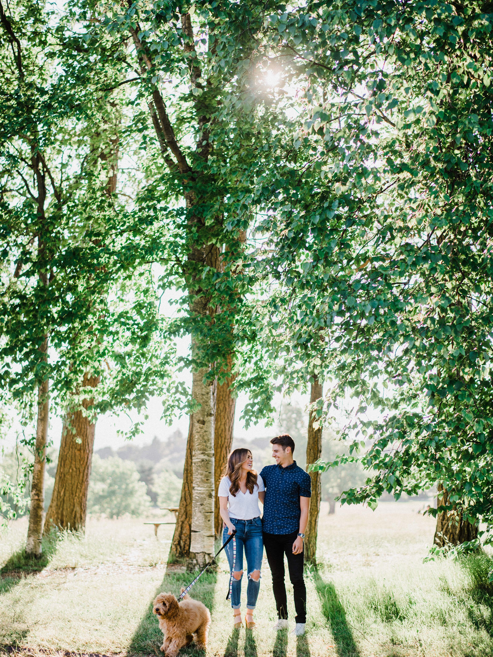 041-summery-engagement-session-with-a-goldendoodle-at-discovery-park-on-film.jpg