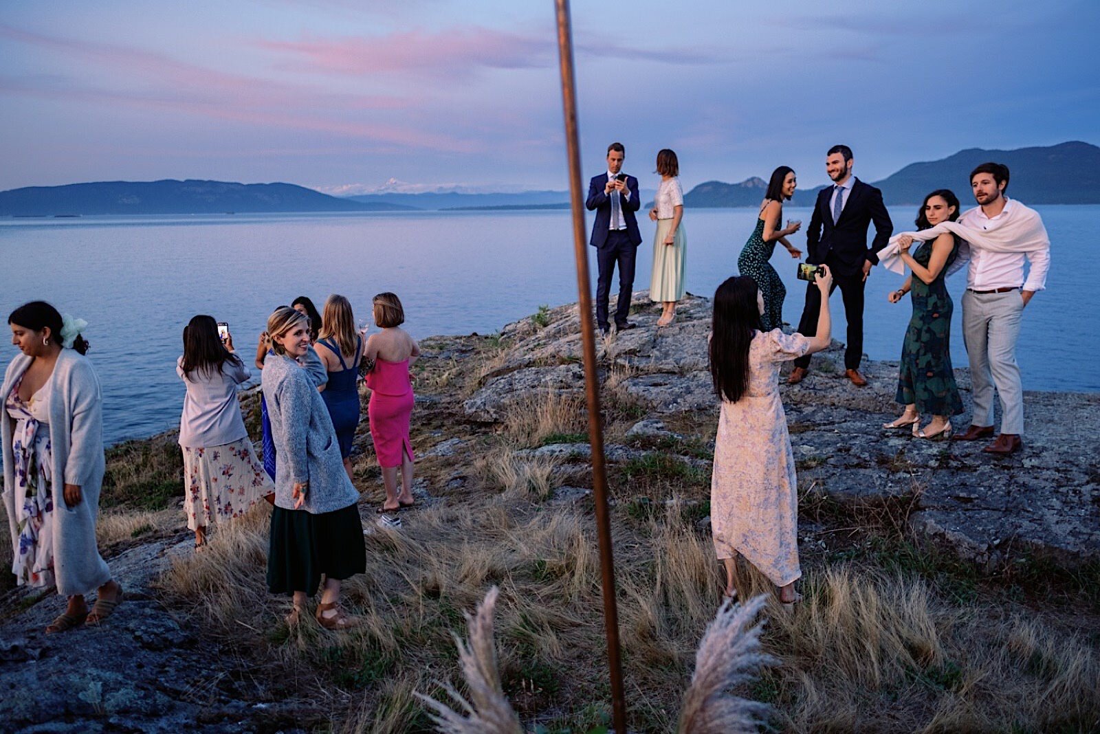 86_guests_sunset_Views_from_Island_Wedding_With_the_enjoying_Outdoor_Orcas.jpg