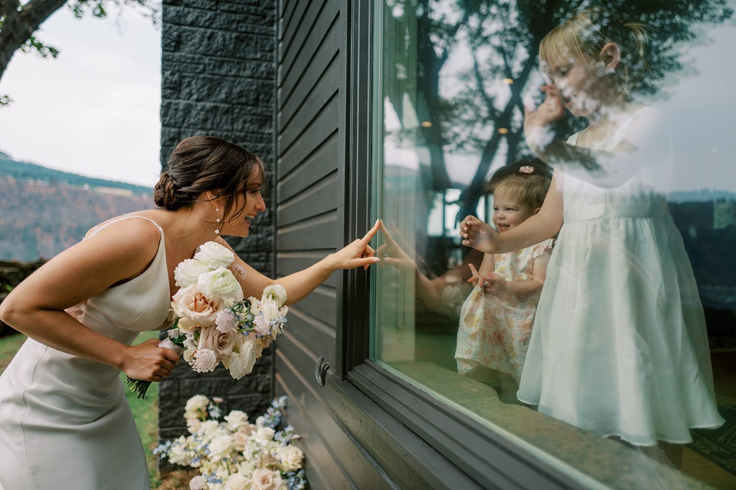 007_funny moment between a bride and the flower girls, photographed on a Leica Q, by Ryan Flynn.jpg