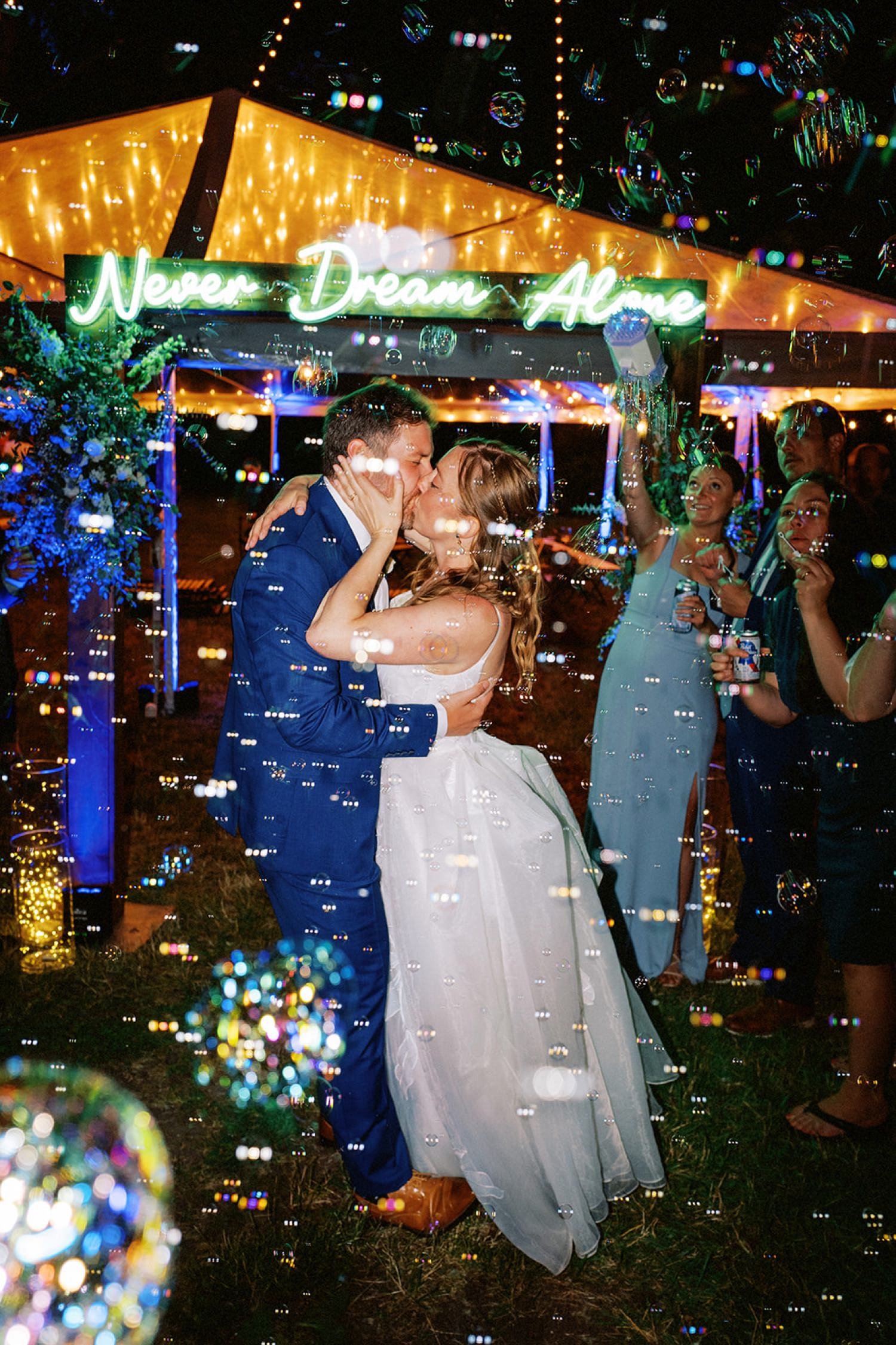 077_Lakedale Resort wedding with colorful neon sign and a bubble exit.jpg