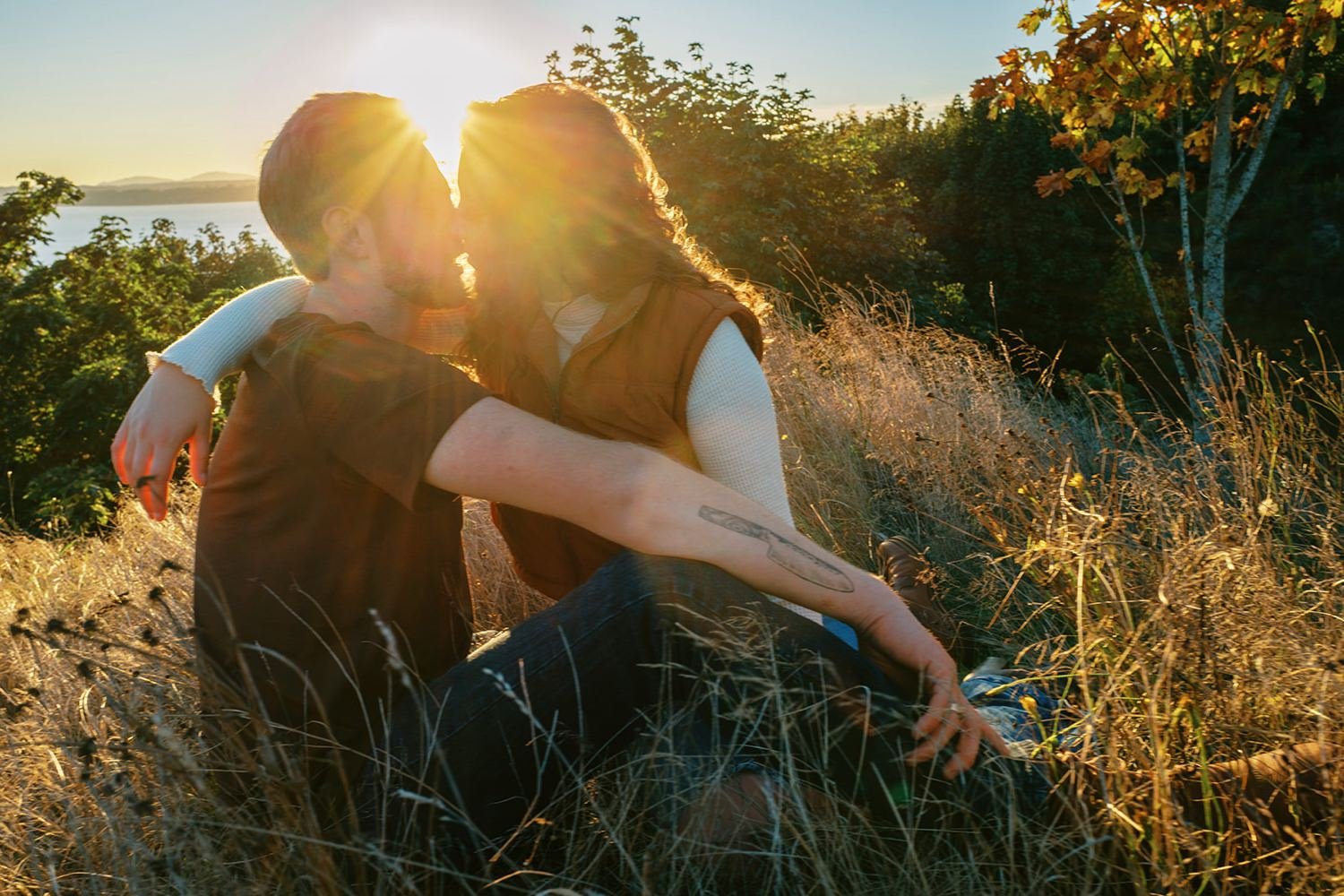 094_Film engagement portraits at Discovery Park in Seattle.jpg