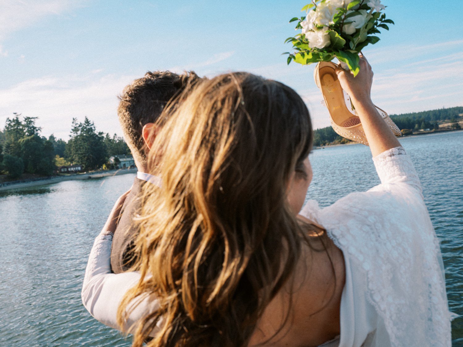 081_A bride and groom arrive to their wedding by Seaplane from Kenmore Air, at the Captain Whidbey inn.jpg