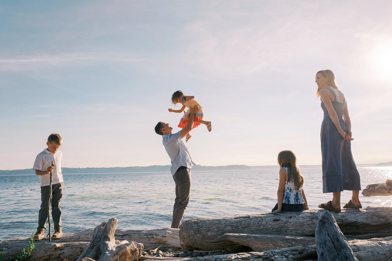 a family photo on the water at Lincoln Park in West Seattle by Seattle Family photographer Ryan Flynn