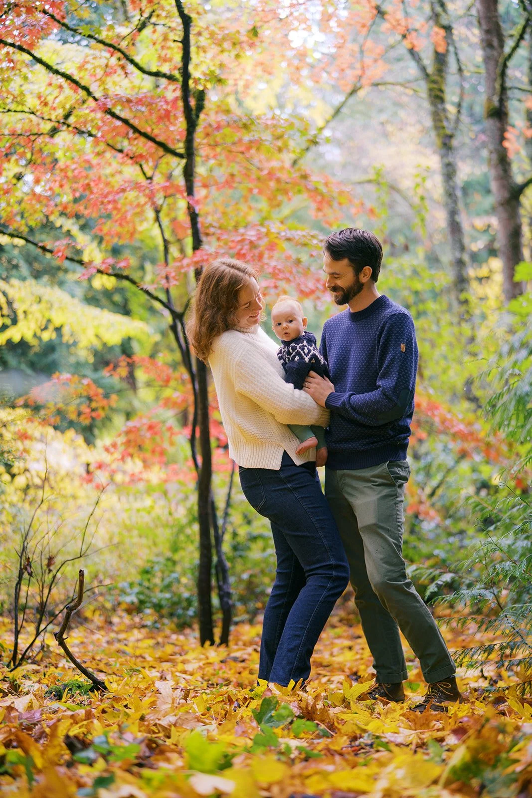 colorful and rainy fall family portraits in the Seattle arboretum by Ryan Flynn Photography