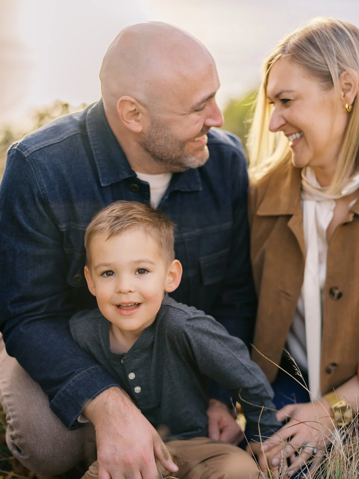 family portraits at Discovery Park in Seattle in a filmy natural candid style, by Ryan Flynn Photography