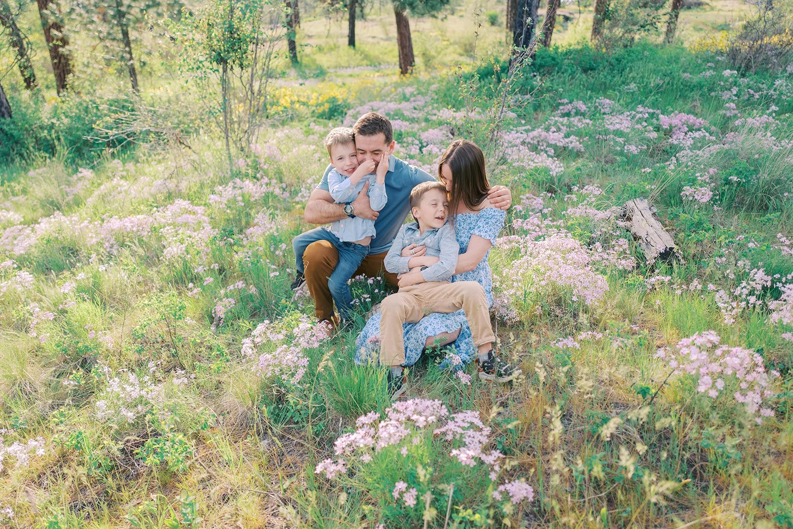 a natural candid family portrait wildflowers in Spokane, WA by best Spokane and Coeur d'Alene family photographer Ryan Flynn 
