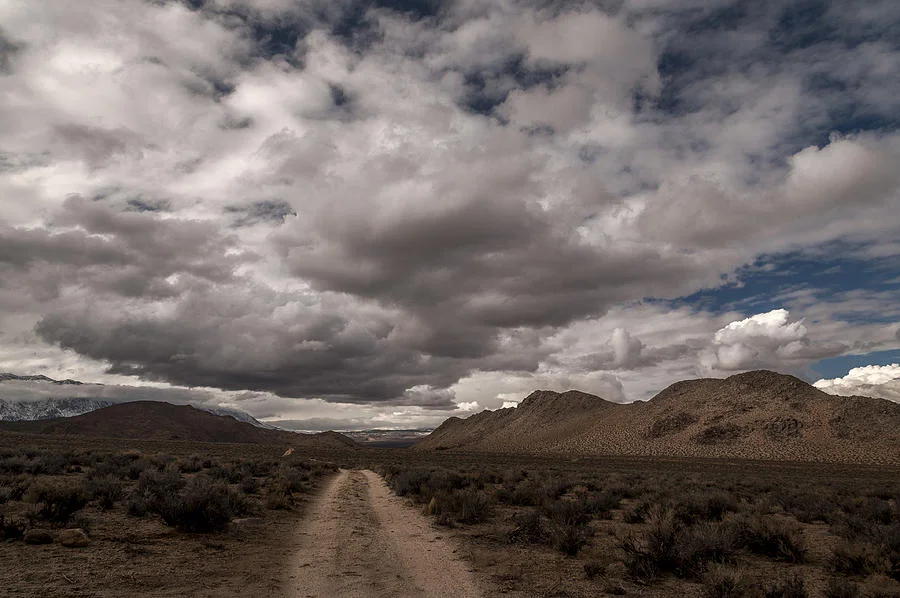 dirt-road-and-clouds-cat-connor (1).jpg