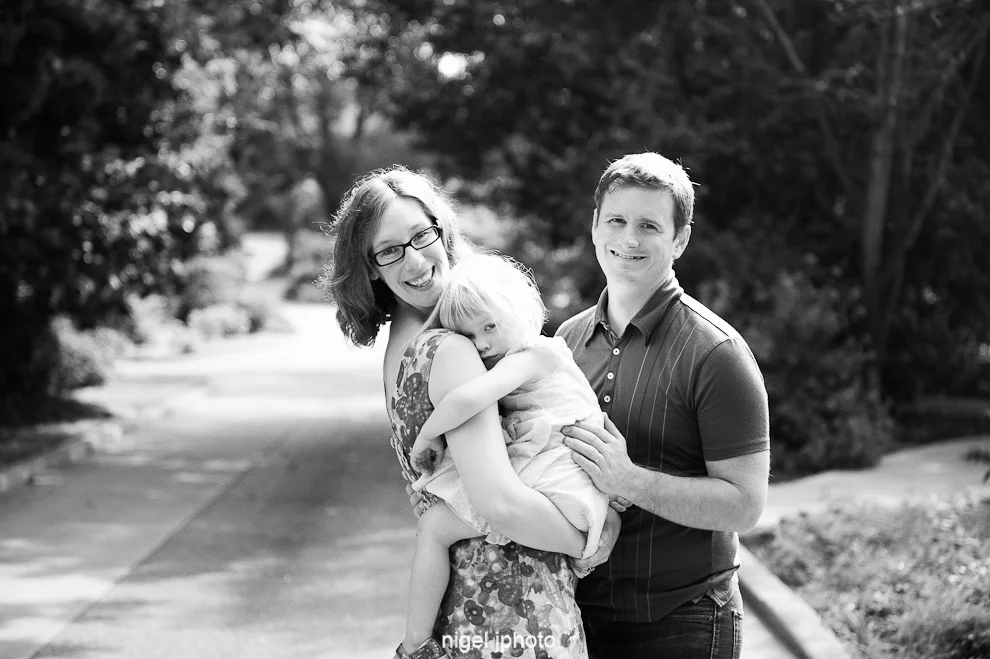 family-portrait-photography-seattle-ballard-locks-young-couple-with-daughter-sleeping.jpg