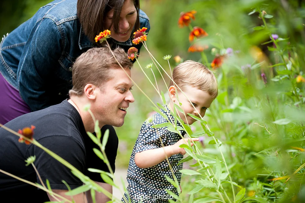 three-year-old-boy-flowers-with-mom-dad-seattle-portrait.jpg