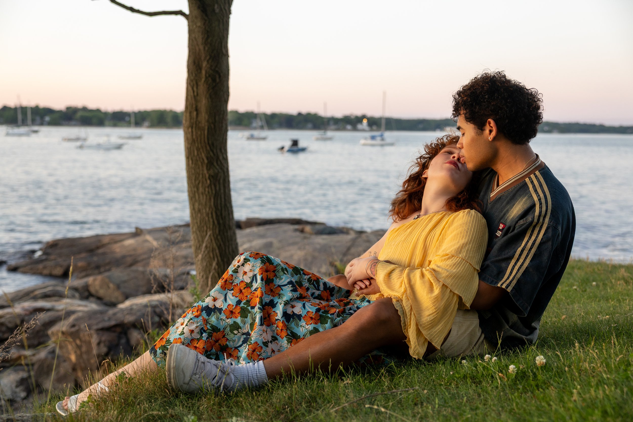 Photography of a couple resting underneath a tree near the water by Boston Wedding Photographer Ryan Richardson Photography