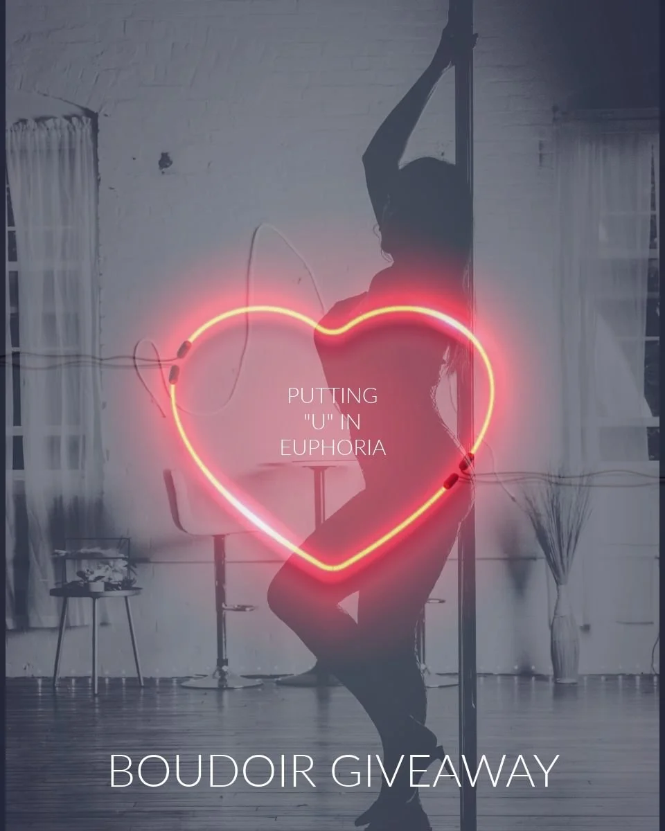 A heart-shaped "neon" light around the text "putting "u" in euphoria" superimposed over a boudoir photography of a woman leaning sensually against a pole. Bottom text says: "Boudoir Giveaway"