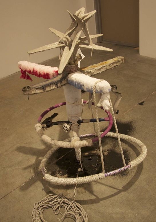  hydraulic office chair, batting, shelf brackets, gaffer’s tape, ballast, hula hoop, rope, terry cloth arm bands, dye, bleach  47" x 30" x 30"  Otis College of Art and Design  Bolsky Gallery  Los Angeles, CA  2012 