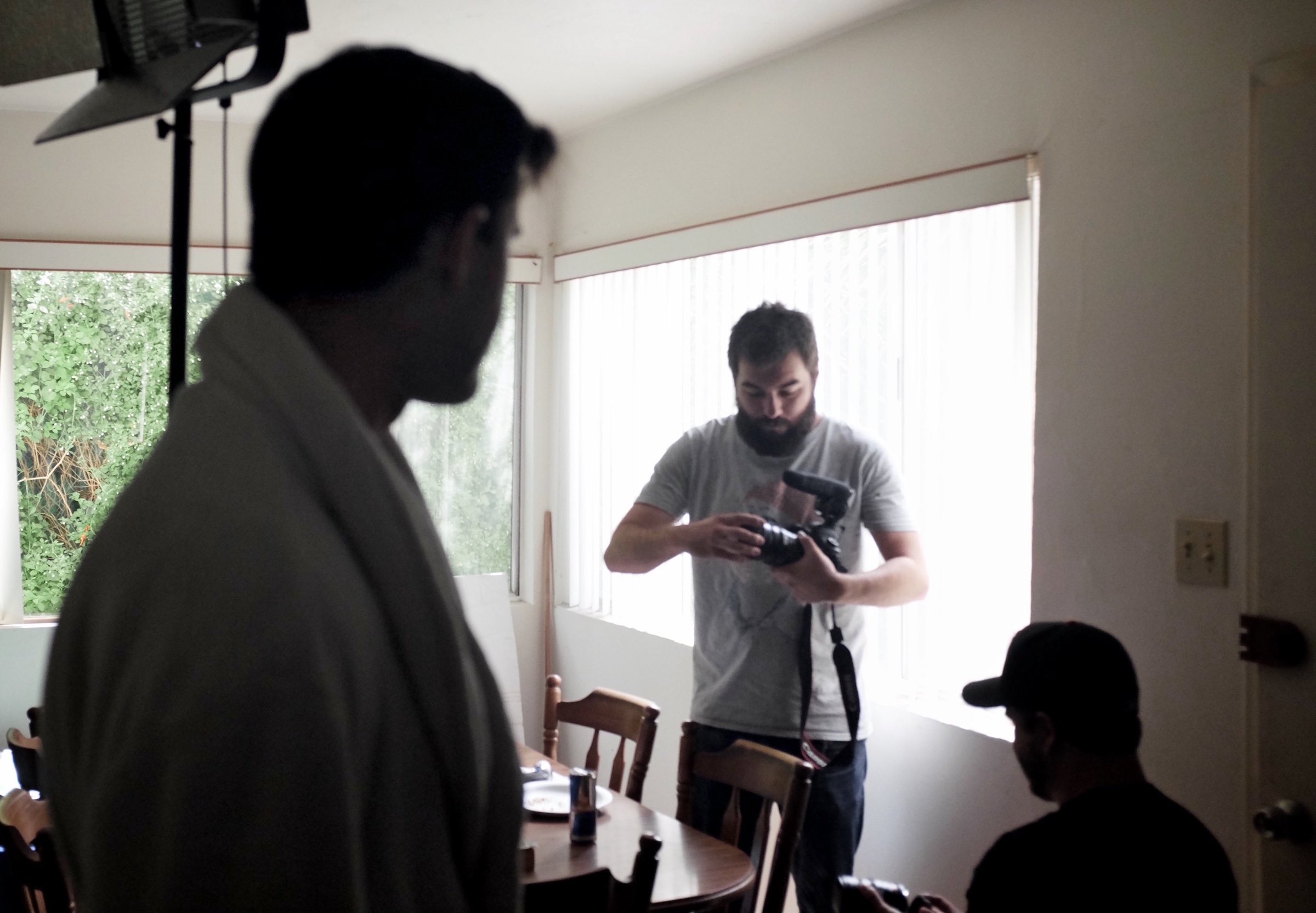 Zach Frankart, director of photography and producer, prepares the camera