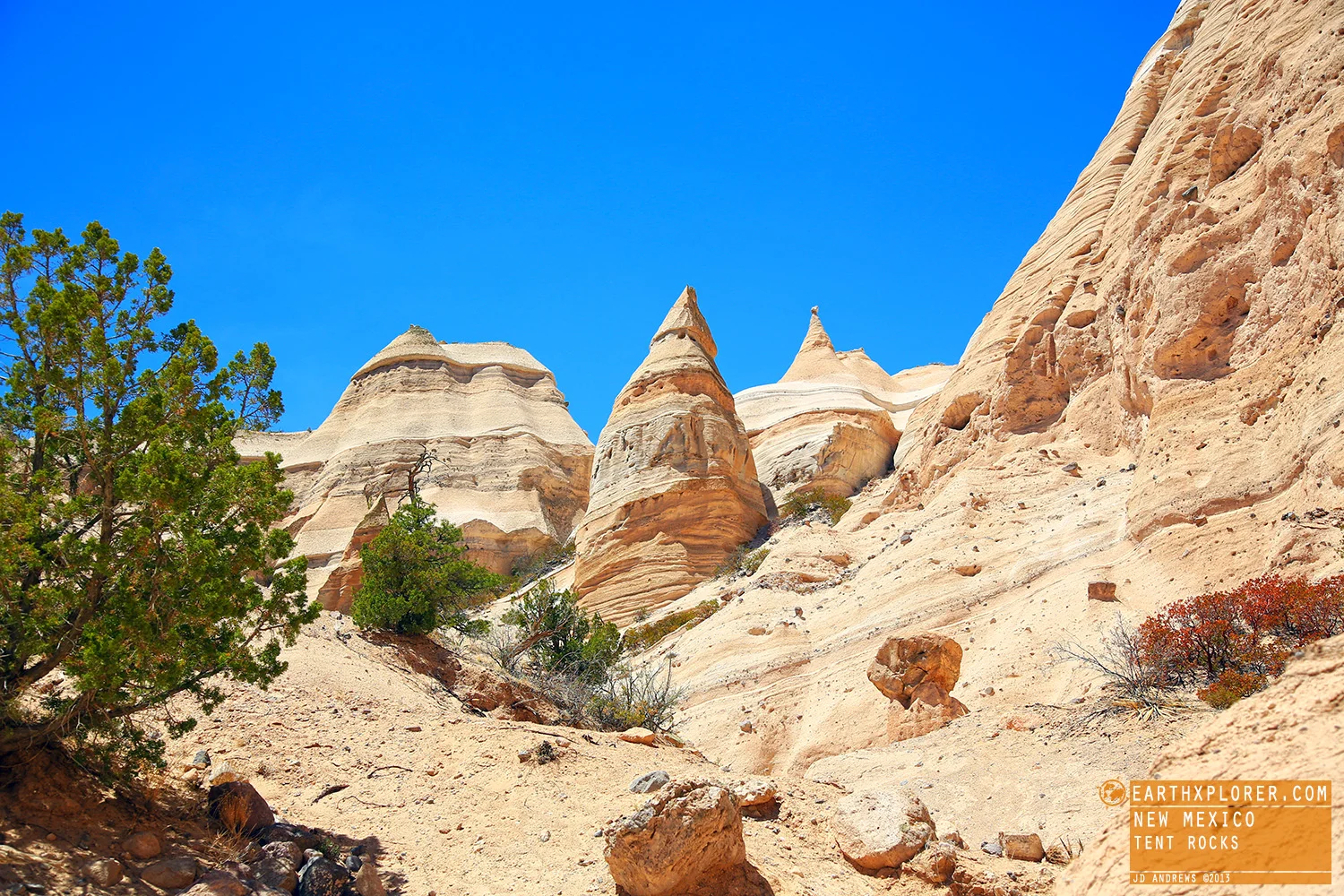 The cone-shaped tent rock formations are the products of volcanic eruptions that occurred 6 to 7 million years ago