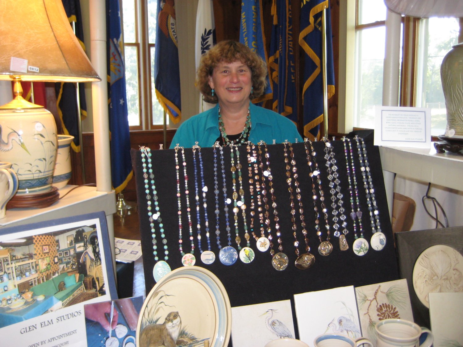  Jean Higgins with her handcrafted pendants.  