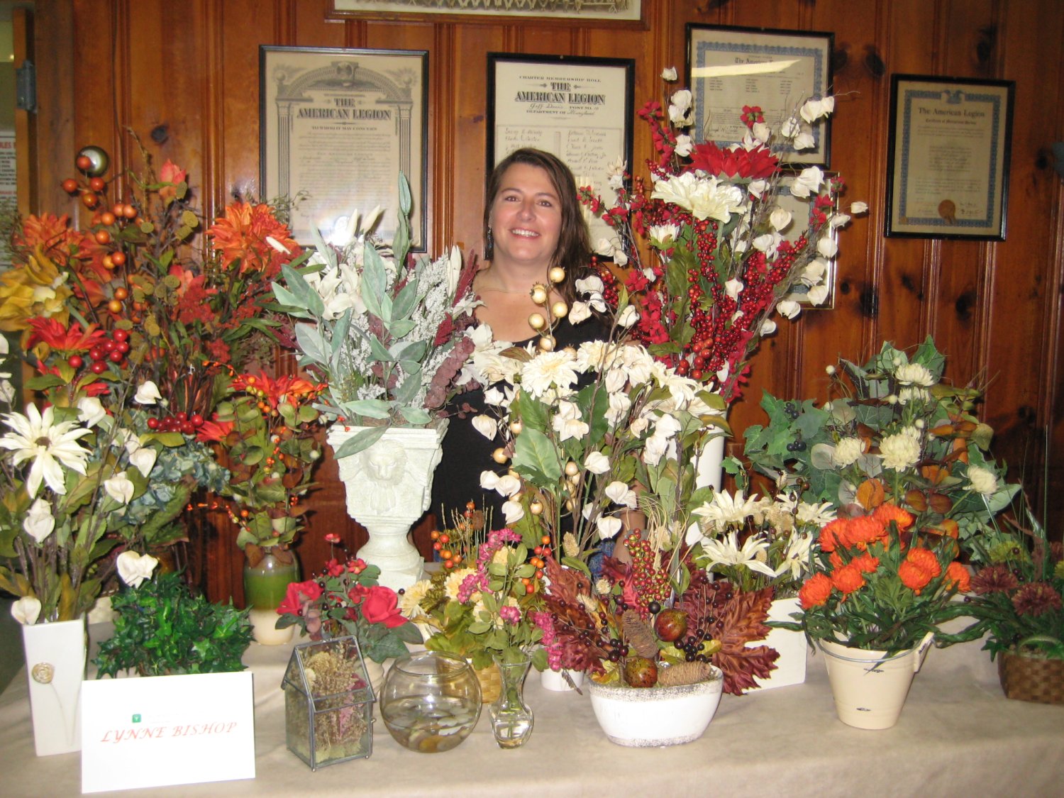  Lynne Bishop shows her beautiful silk flower arrangements.  