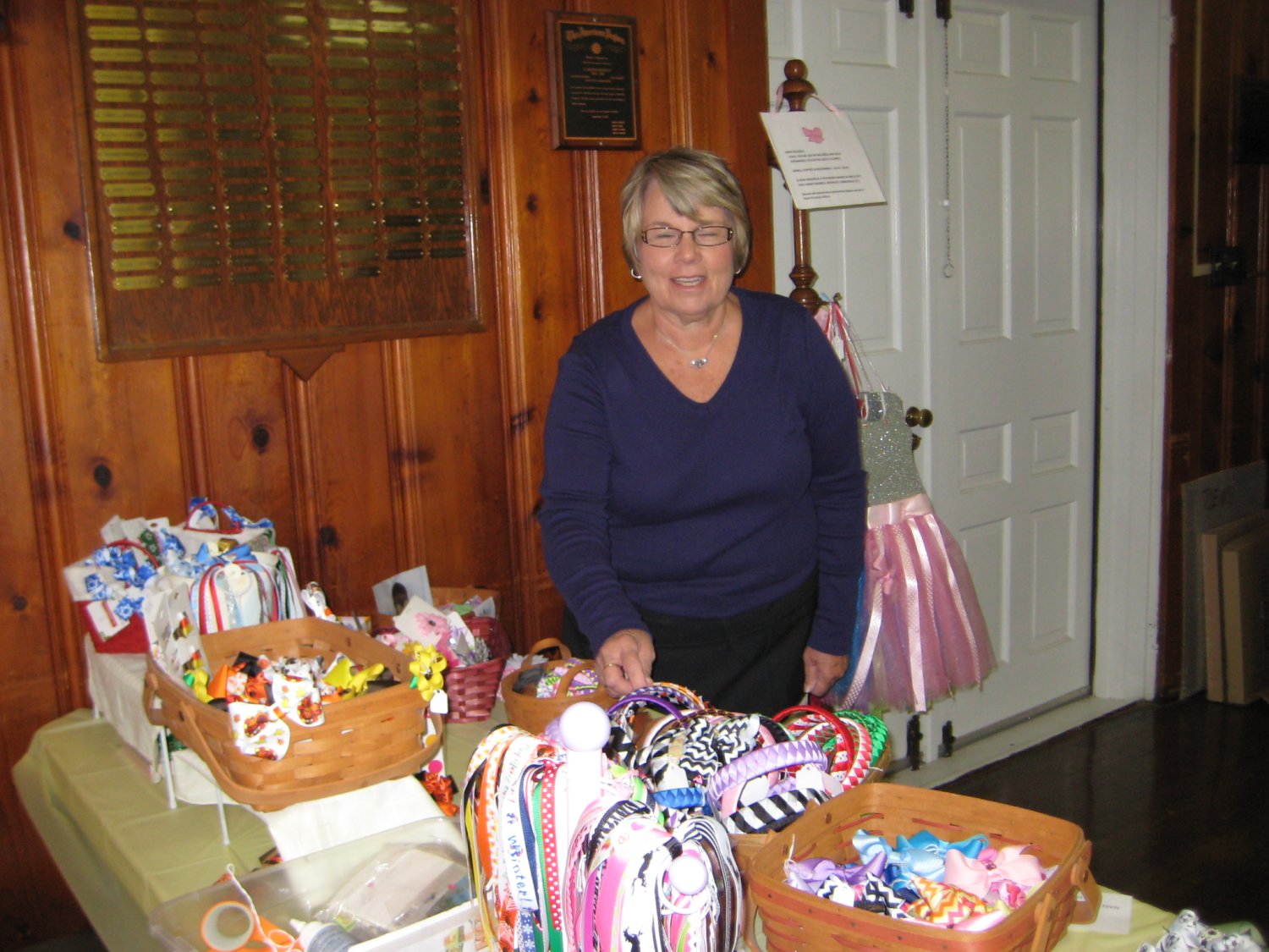  Pat Kindle offered lots and lots of handcrafted children's bows, bow holders, headbands, pony tail holders, flower clips, and more.  