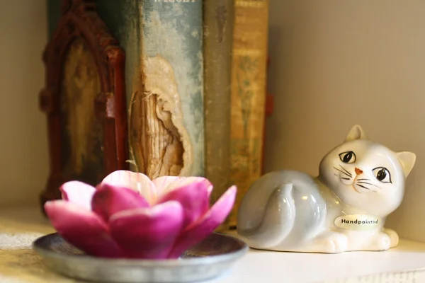 A few vintage finds and delicate flower candle.
