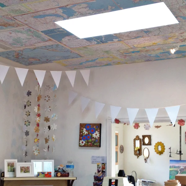 Maps on the ceiling decorated withwhite banners
