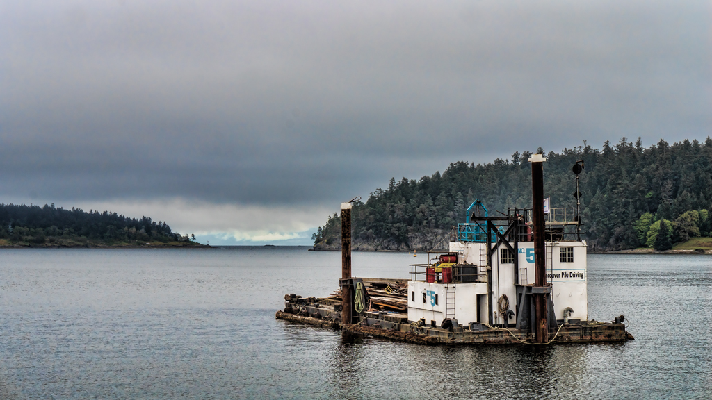 Standing at the base of Departure Bay and looking out past Newcastle Island on your right, though to the Sunshine Coast on the horizon.