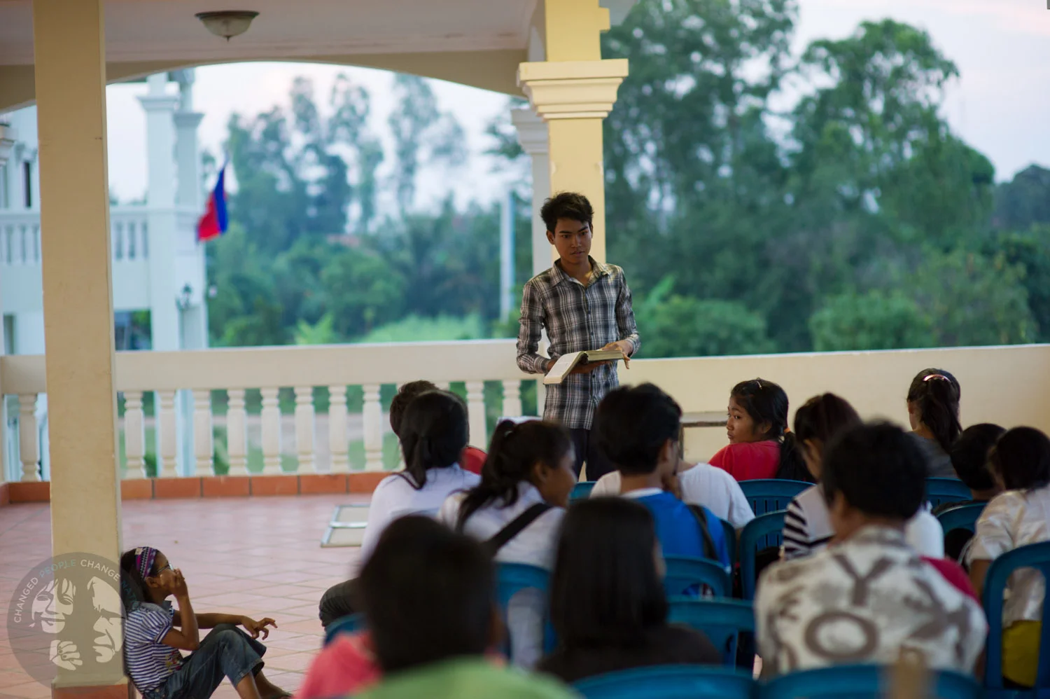 Sarak sharing the Word.